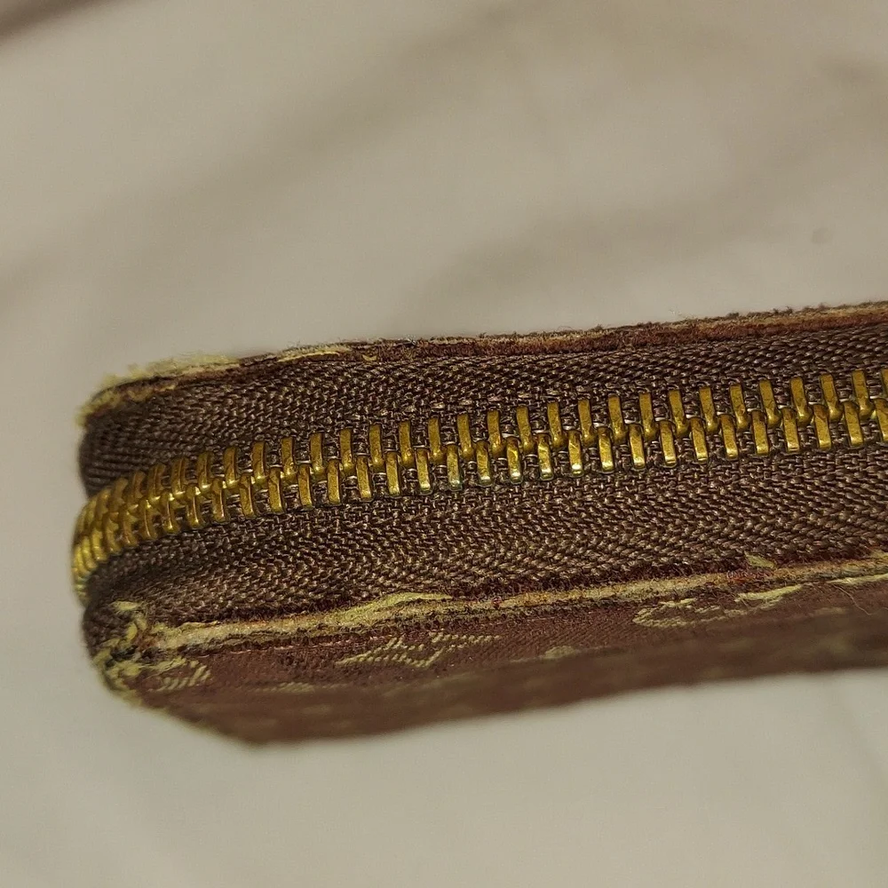 Authentic Louis Vuitton Brown Denim Min Lin Long Zippy wallet